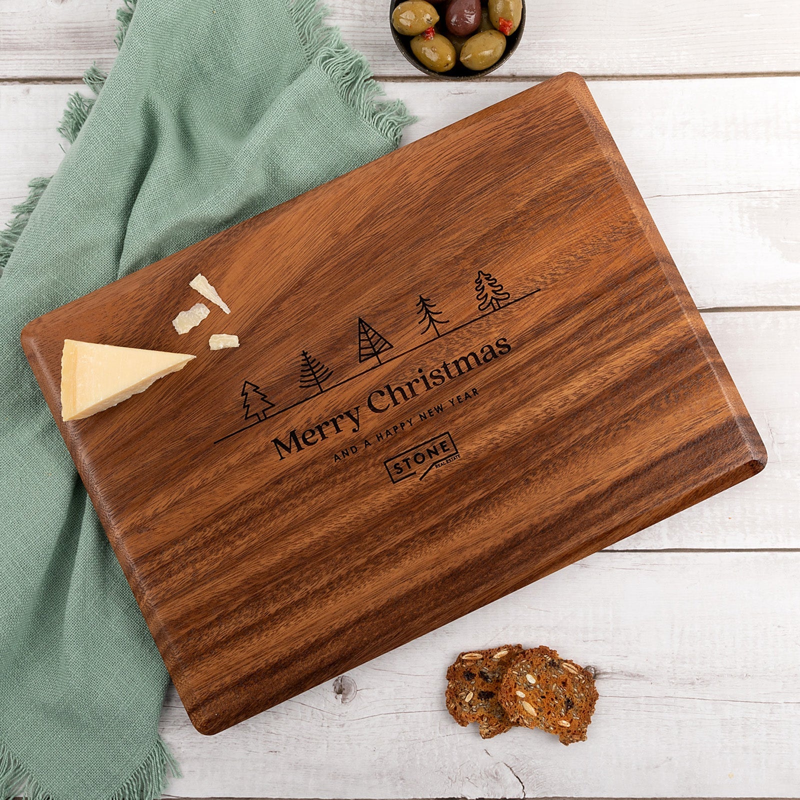 Engraved walnut wood serving board with company logo, perfect for corporate Christmas gifting