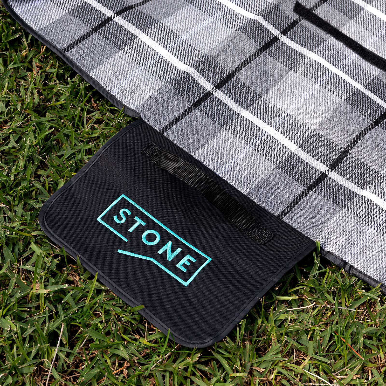 Corporate picnic blanket gift with waterproof backing and custom stitched branding